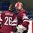 SPISSKA NOVA VES, SLOVAKIA - APRIL 20: Latvia's Niks Krollis #26 and Niklavs Rauza #30 have words prior to relegation round action against Belarus at the 2017 IIHF Ice Hockey U18 World Championship. (Photo by Steve Kingsman/HHOF-IIHF Images)

